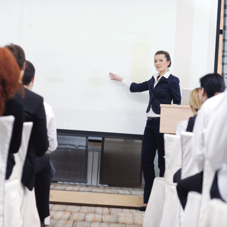 business woman giving presentation